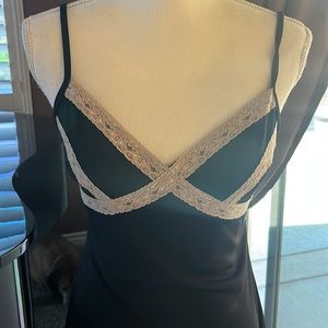 Little coquette black slip dress. Lace around bodice